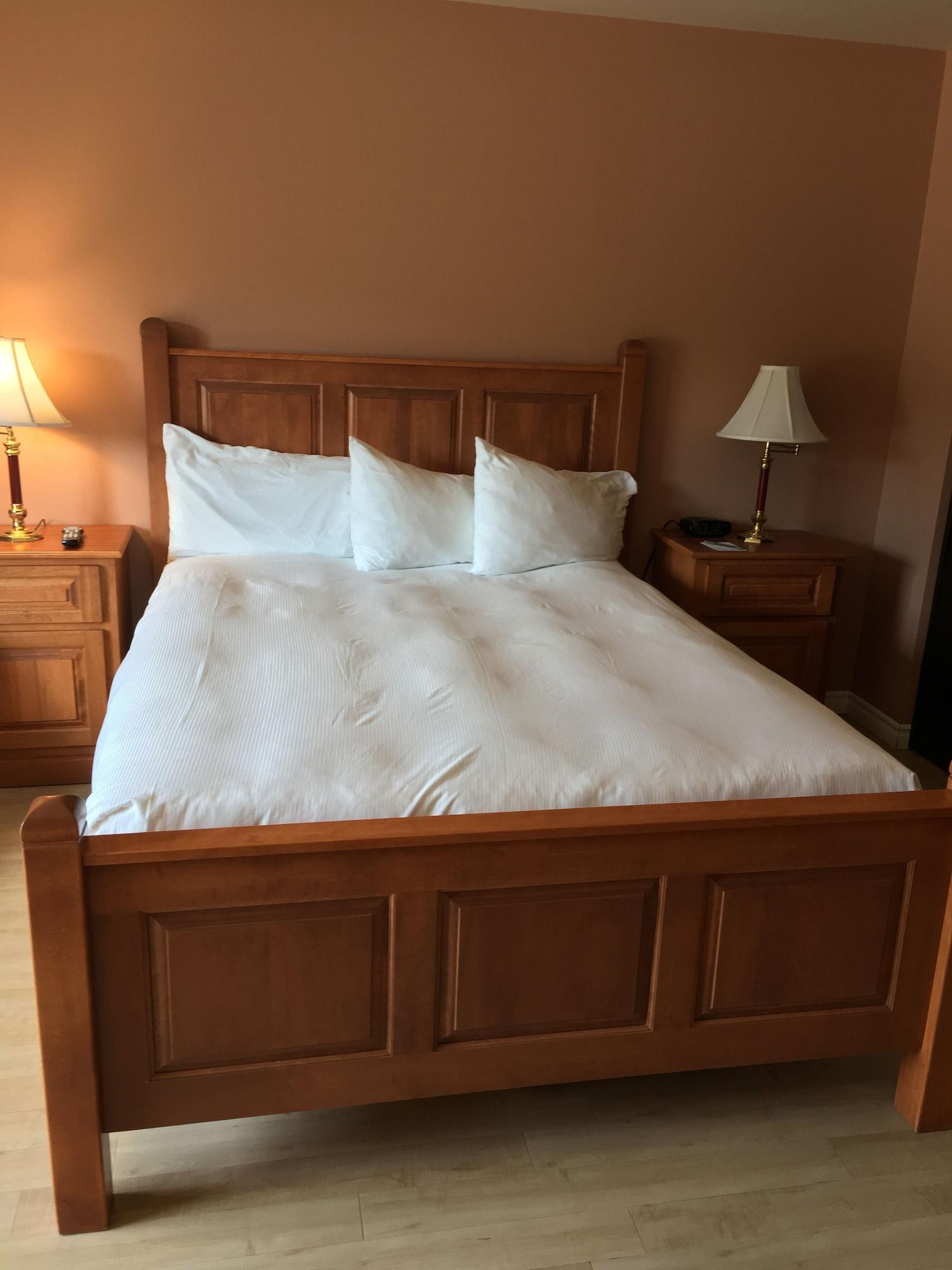 Hotel Baie Saint Paul Bagian luar foto